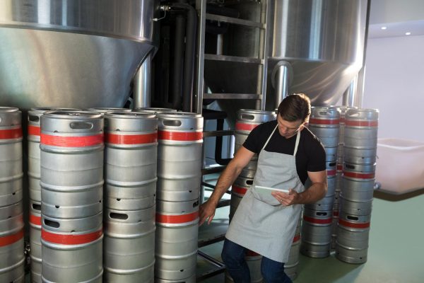 Worker counting kegs